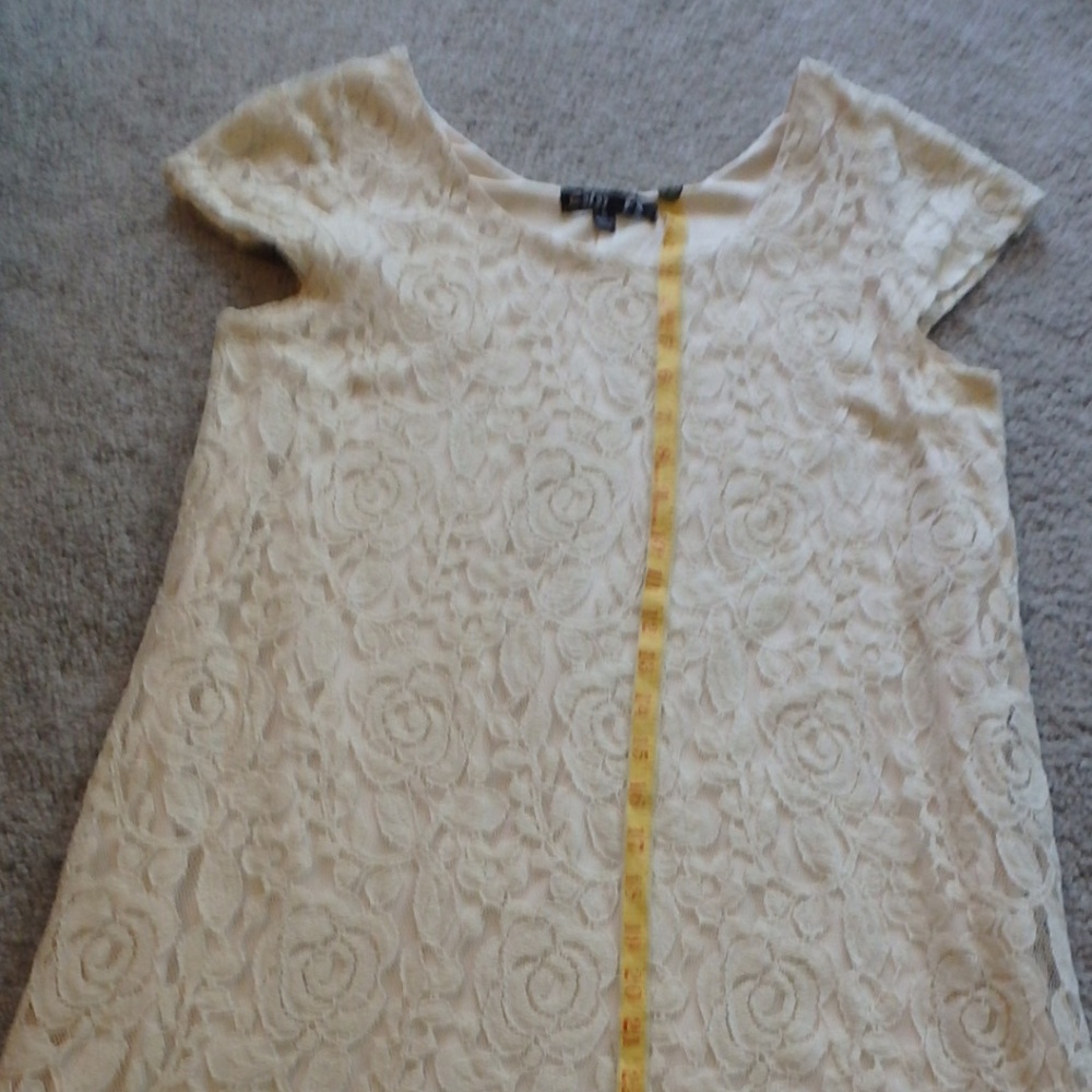 Fully lined ivory lace dress